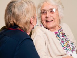 A resident with a nurse at our care home in Lincoln